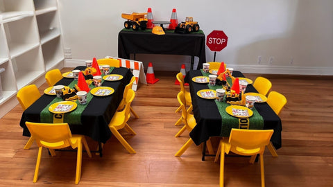 yellow chairs and tables construction party theme