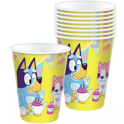 Set of colorful paper cups with cartoon characters on a white background